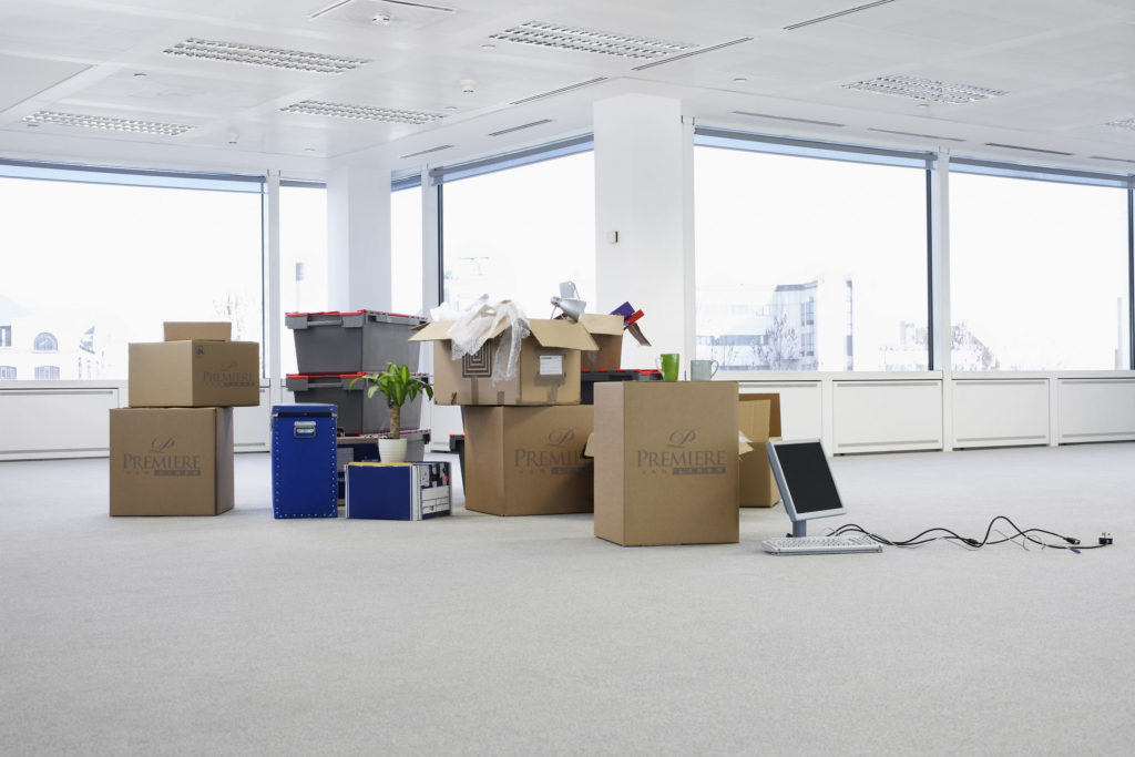 Stack of boxes in empty office