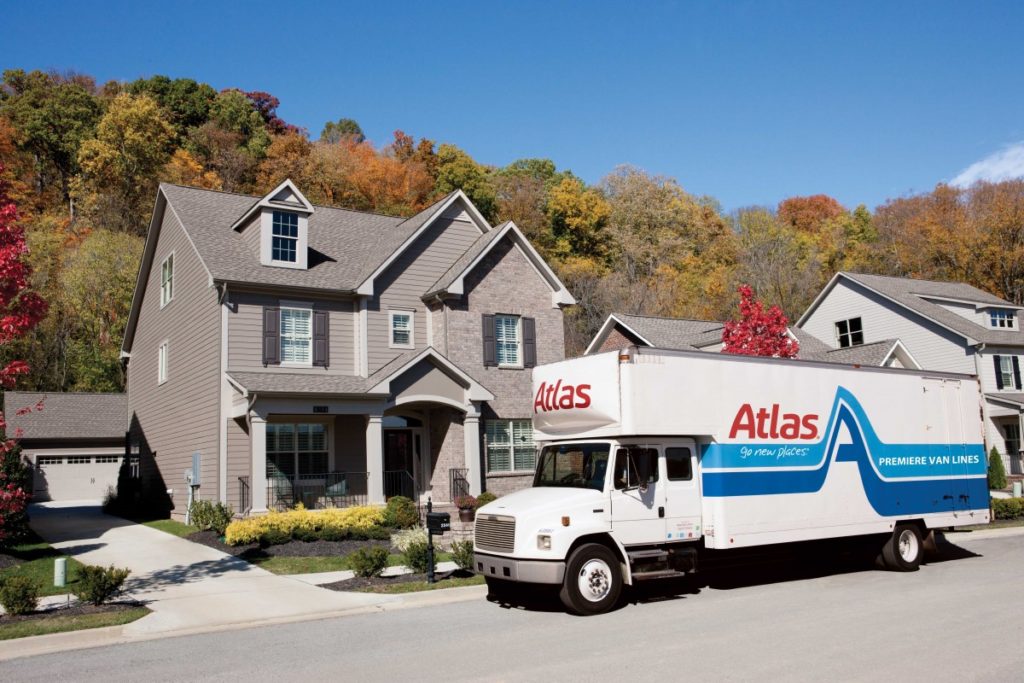 Premiere Atlas Truck in front of home