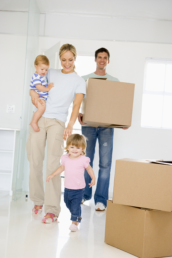 Family with box moving
